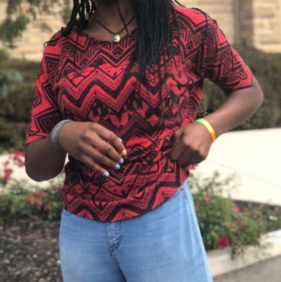 A red and black patterned shirt - Picture 3 of 3